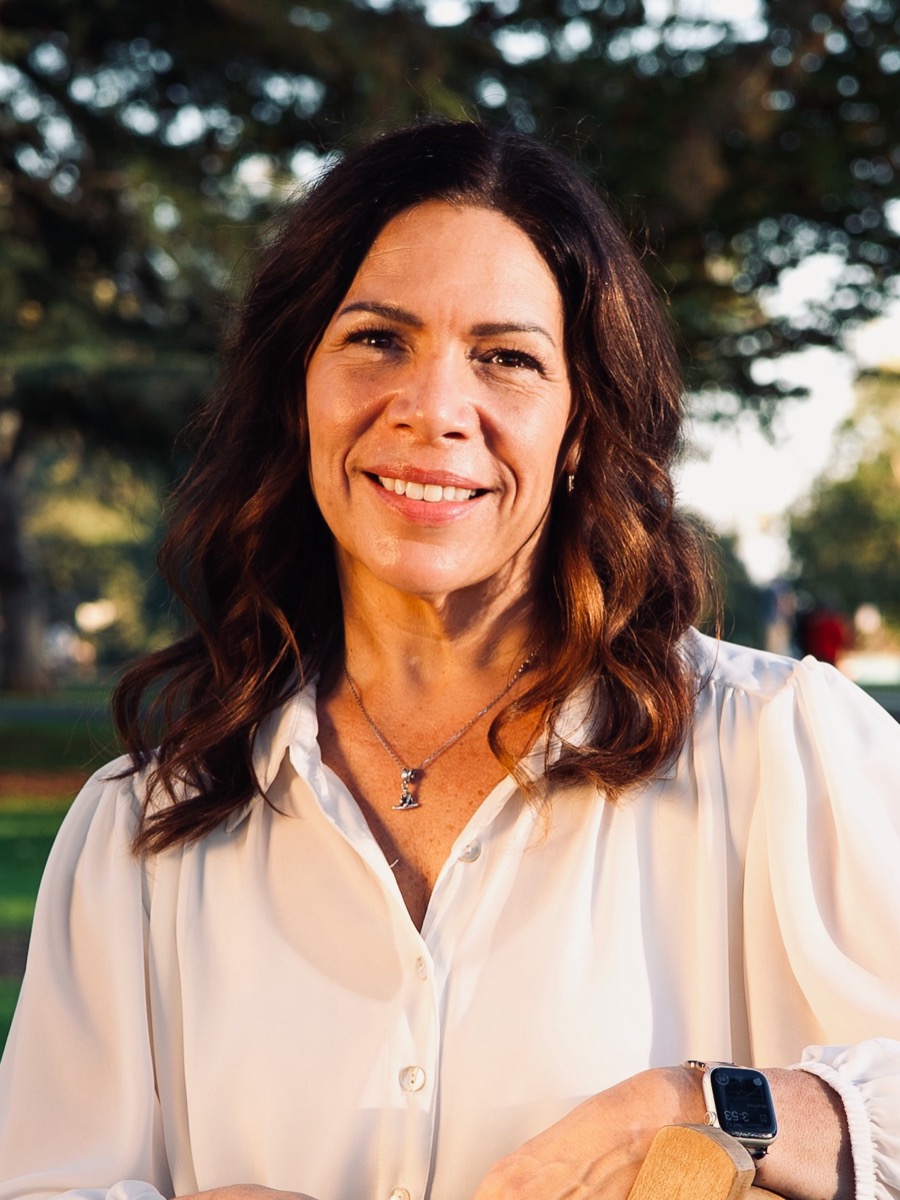 Molly Christensen smiling outdoors
